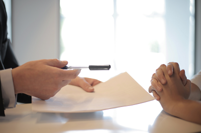 a person signing a document